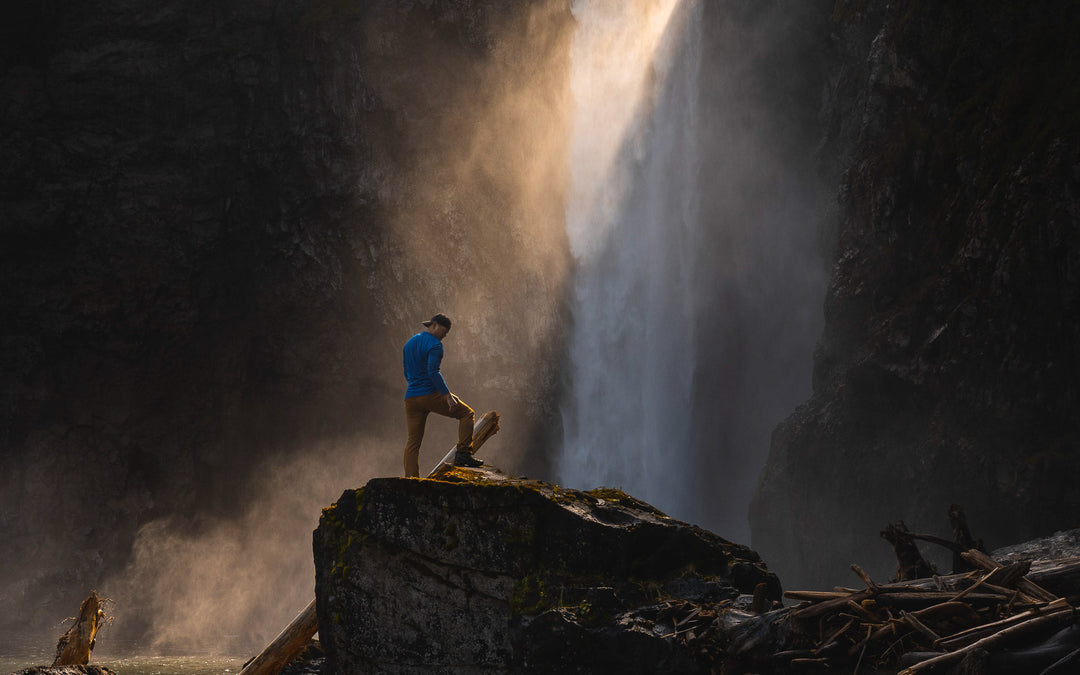 Photo of Man Under Waterfall in MuskOx Outdoor Apparel Breathable Base Layer