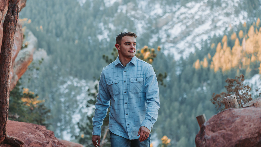 Man Hiking in Grand Flannel Shirt in Glacier Pattern