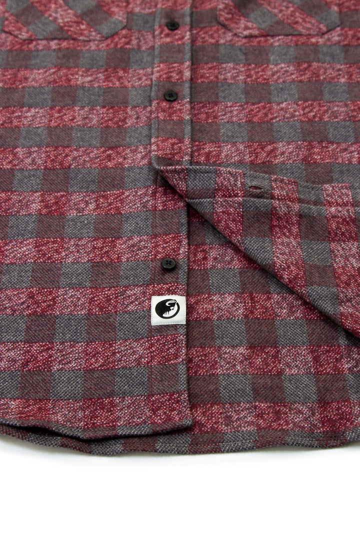 The Grand Flannel in Burgundy By MuskOx. The Burgundy Grand Flannel is a Heavyweight Flannel by MuskOx Outdoor Apparel. 100% Cotton, Durable Flannel Shirt. Our flannels are made of a heavy duty cotton twill with a soft brushed finish so you can be prepared for any adventure without sacrificing comfort. Since we want you to be built for every occasion, we've included two secure chest pockets.
