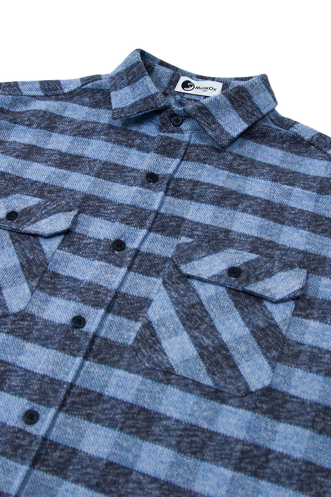 The Grand Flannel in Cadet Blue By MuskOx. The Cadet Blue Grand Flannel is a Heavyweight Flannel by MuskOx Outdoor Apparel. 100% Cotton, Durable Flannel Shirt. Our flannels are made of a heavy duty cotton twill with a soft brushed finish so you can be prepared for any adventure without sacrificing comfort. Since we want you to be built for every occasion, we've included two secure chest pockets.