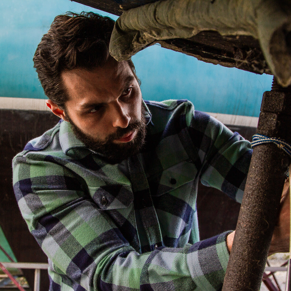 Man in Green and Blue Flannel shirt by MuskOx