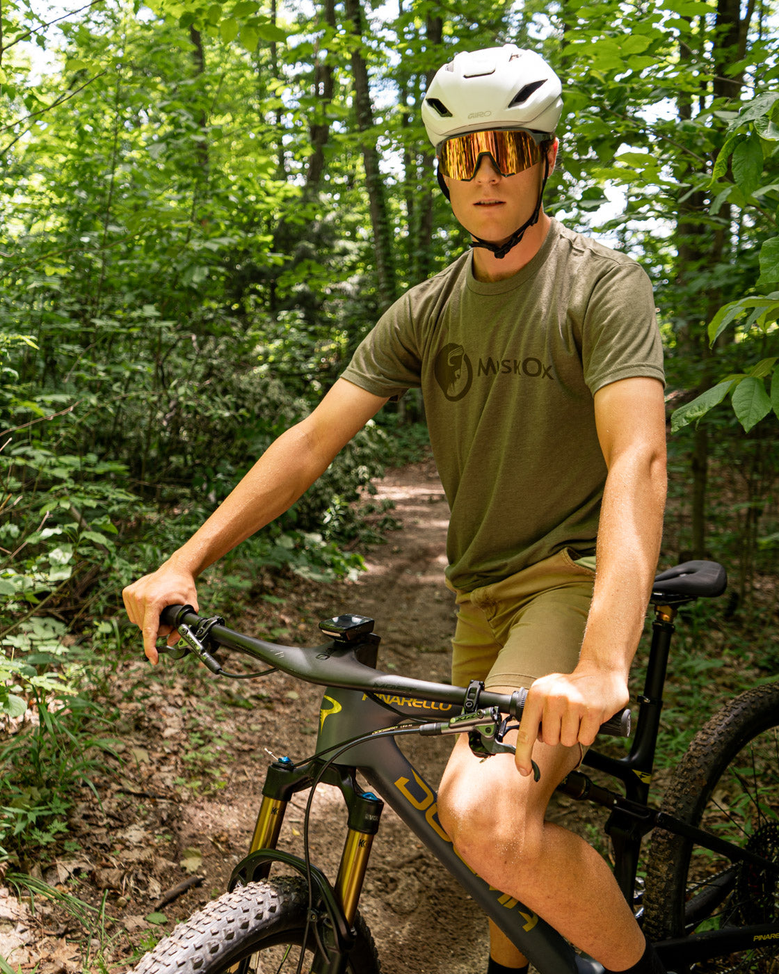 MuskOx Military Green Logo Tee on Mountain Biker, Kyan Olshove