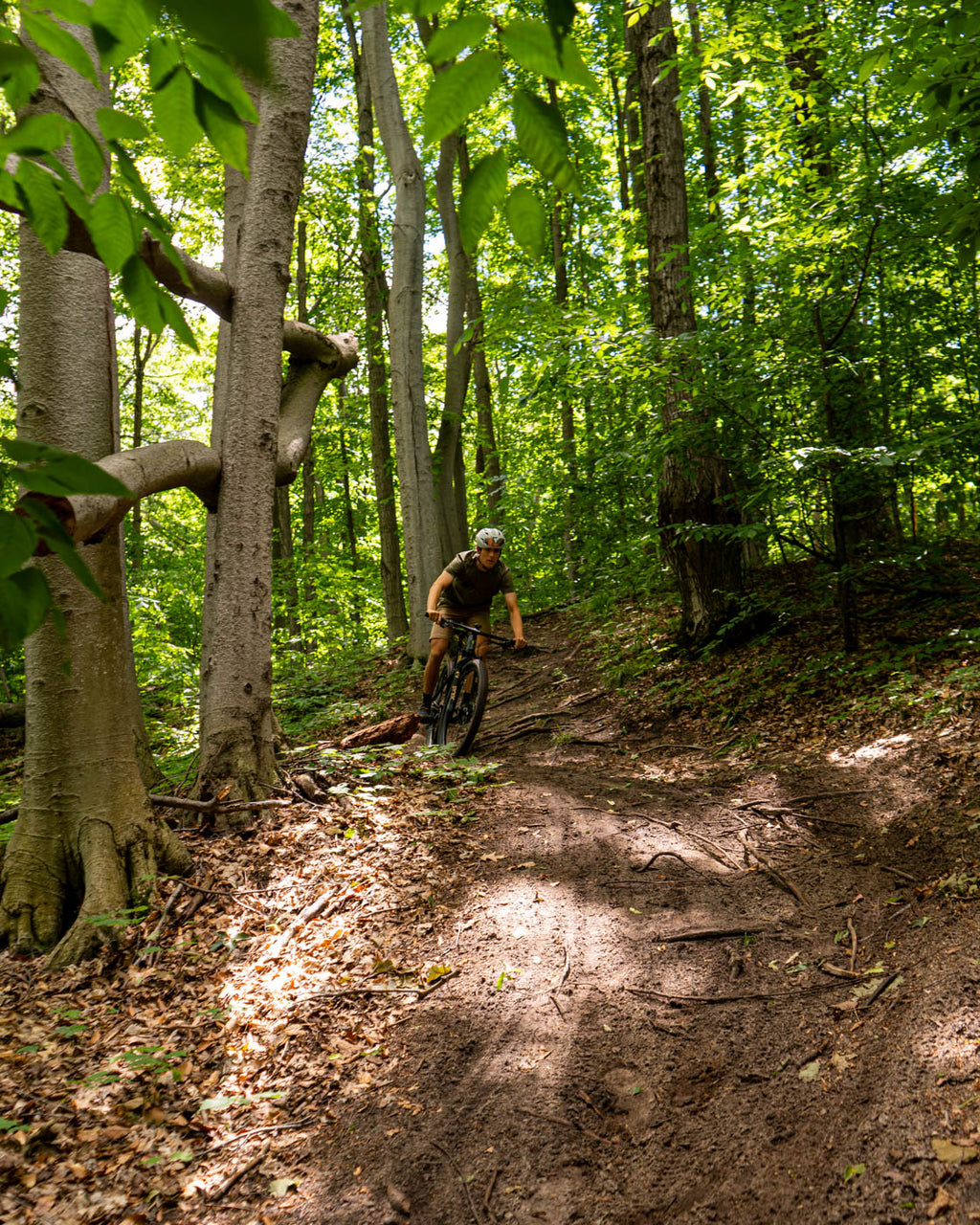 MuskOx Military Green Logo Tee on Mountain Biker, Kyan Olshove