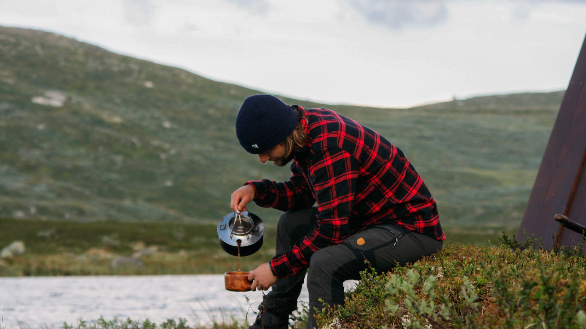 MuskOx Flannels, Man Wearing Red Flannel in wilderness