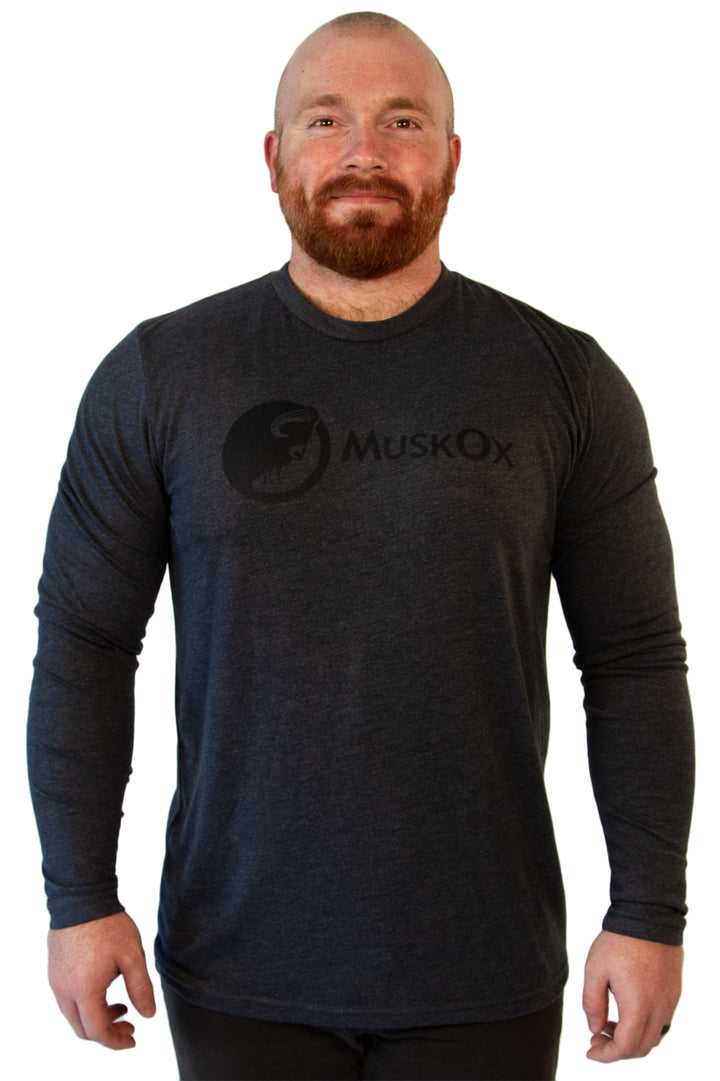 Simple is better, especially when it still gets your point across. Represent the MuskOx herd and the outdoors with our Navy Long Sleeve Tee, without saying a lot. The cotton and polyester blend will make sure you’re always comfortable. And because our tees are pre-laundered, it won’t turn into a kid’s shirt when you wash it.