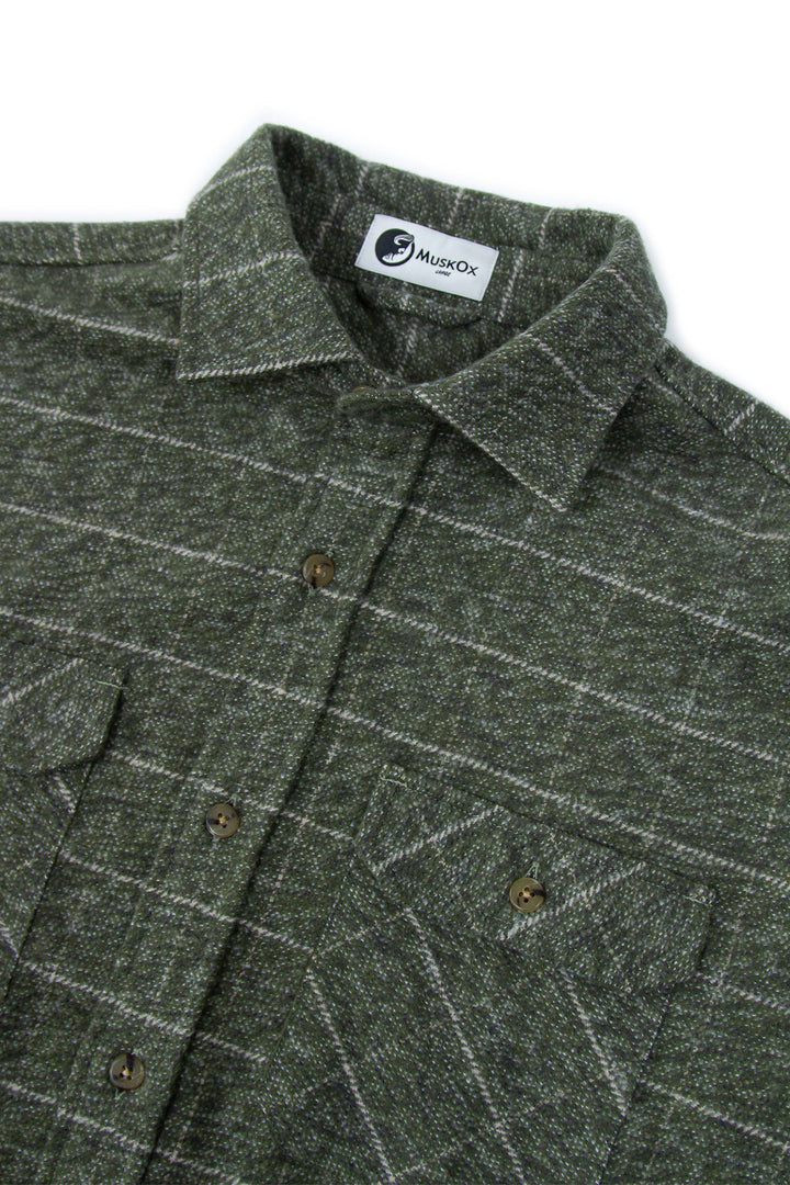 The Grand Flannel in Moss Green By MuskOx. Heavyweight Flannel. MuskOx Apparel The Grand Flannel, Burgundy, Red. 100% Cotton, Durable Flannel Shirt. Our flannels are made of a heavy duty cotton twill with a soft brushed finish so you can be prepared for any adventure without sacrificing comfort. Since we want you to be built for every occasion, we've included two secure chest pockets for you to bring your vitals along.