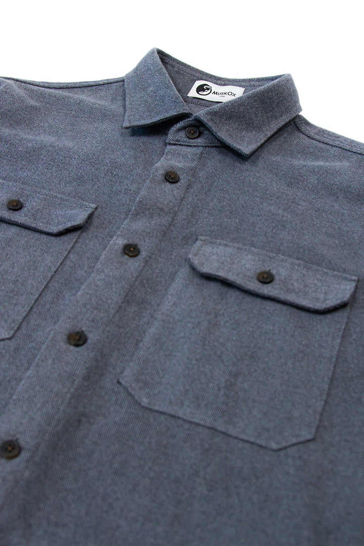 MuskOx Clothing The Yukon Flannel Shirt Jacket, Charcoal. Charcoal Flannel Shirt Jacket. 100% Cotton, Durable Flannel Shirt. Our flannels are made of a heavy duty cotton twill with a soft brushed finish so you can be prepared for any adventure without sacrificing comfort. Since we want you to be built for every occasion, we've included two secure chest pockets and side pockets for you to bring your vitals along.