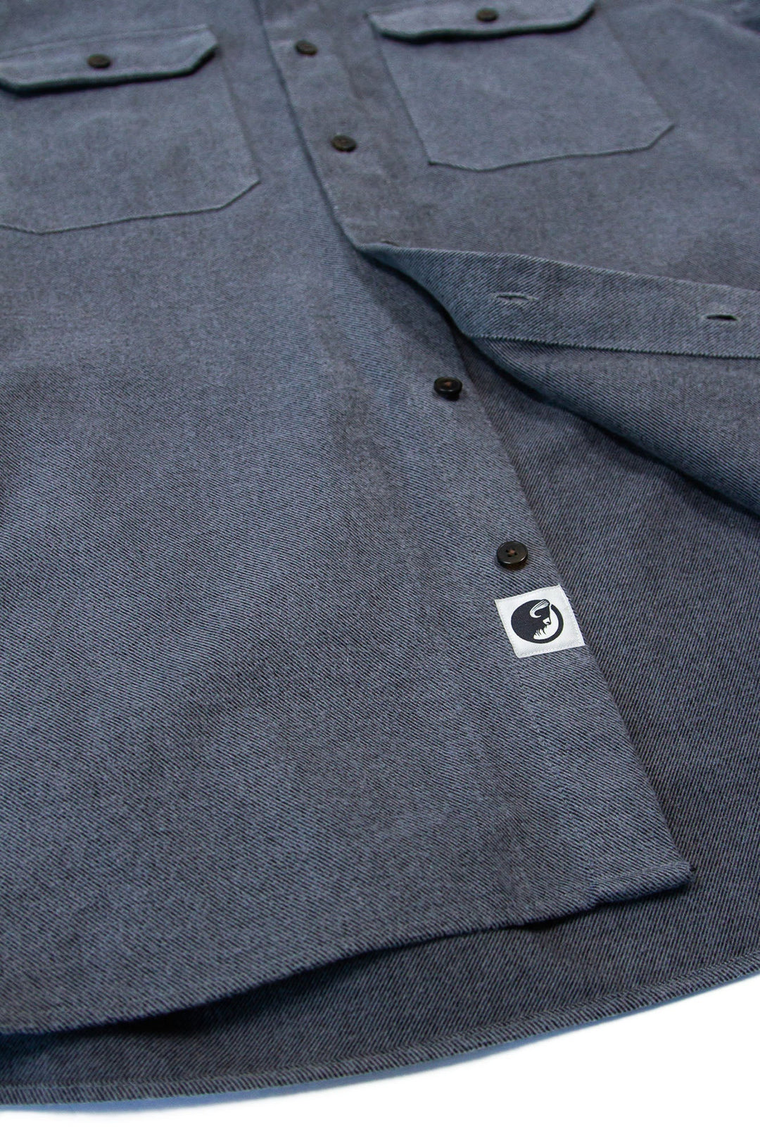 MuskOx Clothing The Yukon Flannel Shirt Jacket, Charcoal. Charcoal Flannel Shirt Jacket. 100% Cotton, Durable Flannel Shirt. Our flannels are made of a heavy duty cotton twill with a soft brushed finish so you can be prepared for any adventure without sacrificing comfort. Since we want you to be built for every occasion, we've included two secure chest pockets and side pockets for you to bring your vitals along.