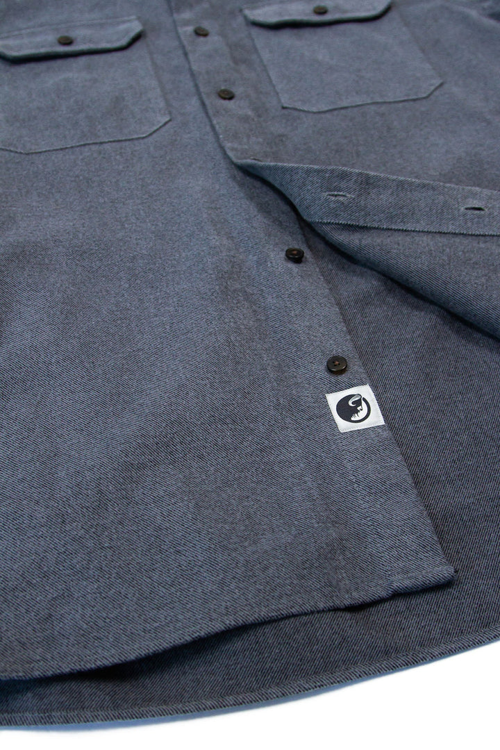 MuskOx Clothing The Yukon Flannel Shirt Jacket, Charcoal. Charcoal Flannel Shirt Jacket. 100% Cotton, Durable Flannel Shirt. Our flannels are made of a heavy duty cotton twill with a soft brushed finish so you can be prepared for any adventure without sacrificing comfort. Since we want you to be built for every occasion, we've included two secure chest pockets and side pockets for you to bring your vitals along.
