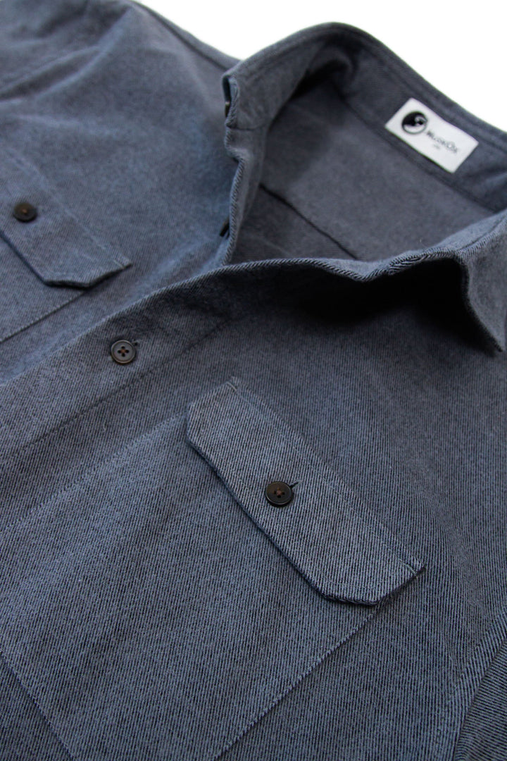MuskOx Clothing The Yukon Flannel Shirt Jacket, Charcoal. Charcoal Flannel Shirt Jacket. 100% Cotton, Durable Flannel Shirt. Our flannels are made of a heavy duty cotton twill with a soft brushed finish so you can be prepared for any adventure without sacrificing comfort. Since we want you to be built for every occasion, we've included two secure chest pockets and side pockets for you to bring your vitals along.