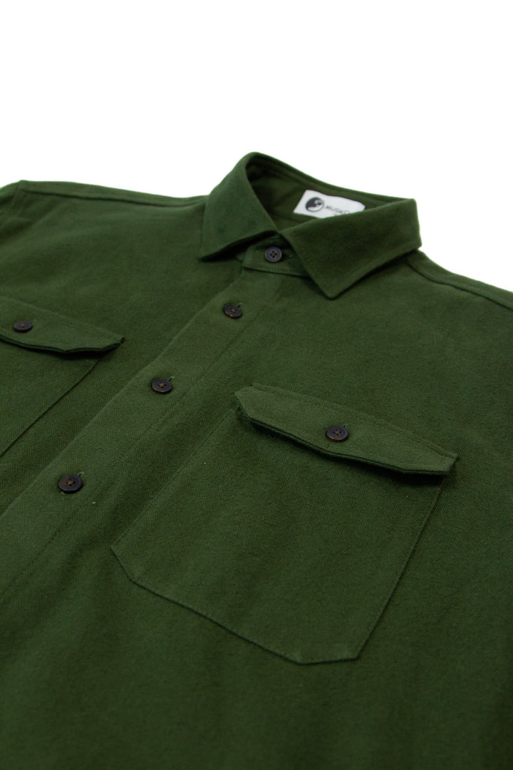 MuskOx Clothing The Yukon Flannel Shirt Jacket, Green. Green Flannel Shirt Jacket. 100% Cotton, Durable Flannel Shirt. Our flannels are made of a heavy duty cotton twill with a soft brushed finish so you can be prepared for any adventure without sacrificing comfort. Since we want you to be built for every occasion, we've included two secure chest pockets and side pockets for you to bring your vitals along.