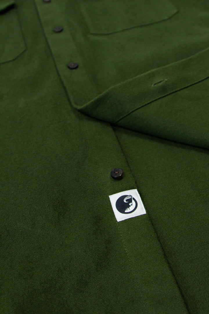 MuskOx Clothing The Yukon Flannel Shirt Jacket, Green. Green Flannel Shirt Jacket. 100% Cotton, Durable Flannel Shirt. Our flannels are made of a heavy duty cotton twill with a soft brushed finish so you can be prepared for any adventure without sacrificing comfort. Since we want you to be built for every occasion, we've included two secure chest pockets and side pockets for you to bring your vitals along.